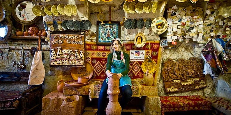 Avanos pottery master shaping clay on the wheel in Cappadocia