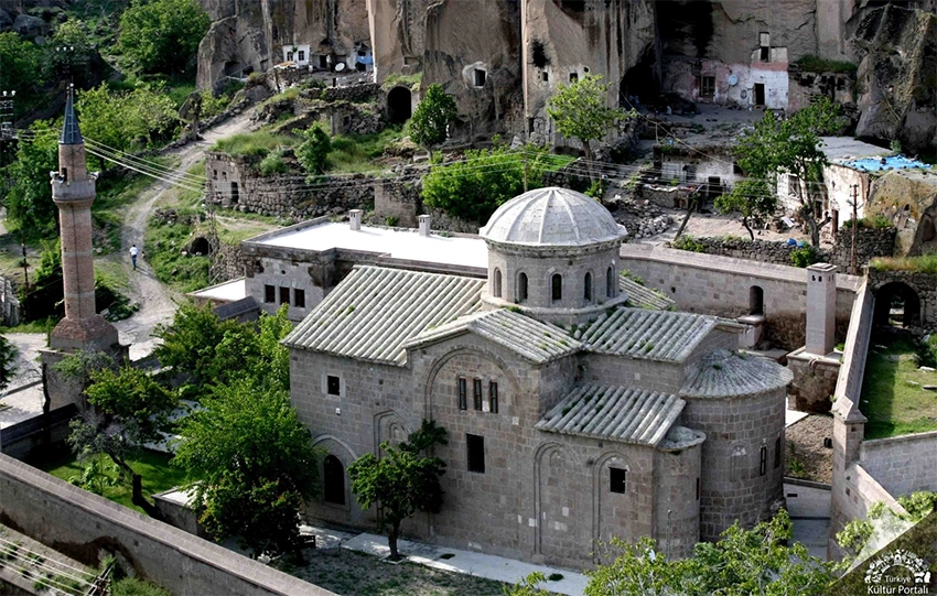 Güzelyurt Church Mosque basilica with minaret and ayazma courtyard