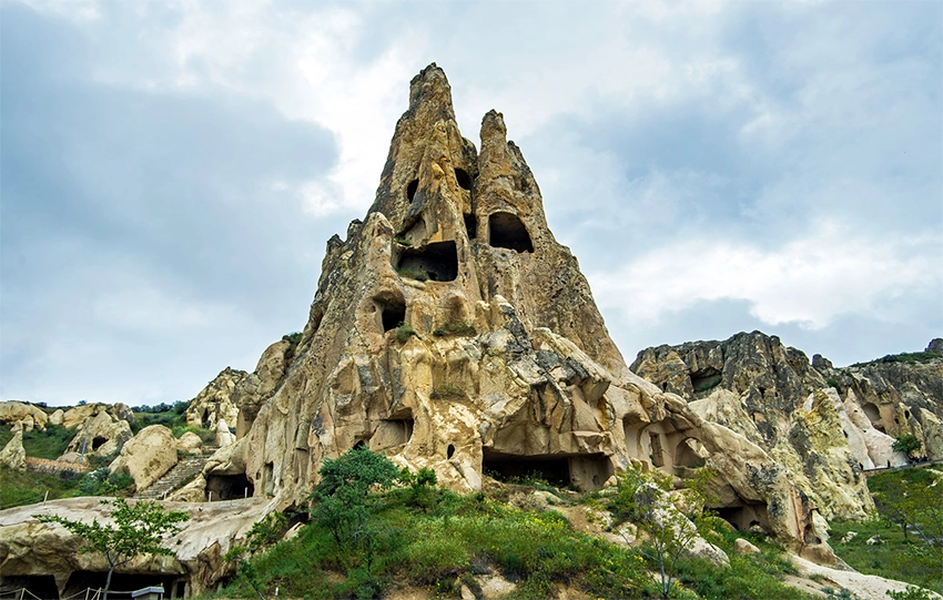 Hidden Church exterior carved into rock slopes of Göreme Valley