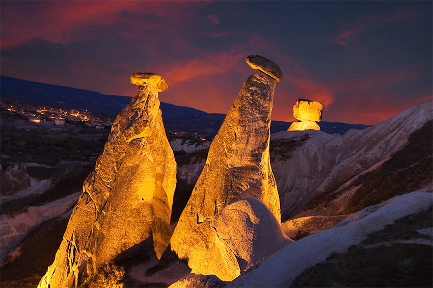The Three Beauties fairy chimneys in Ürgüp with blue sky
