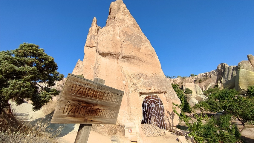 Üzümlü Church exterior carved into fairy chimney in Red Valley Cappadocia