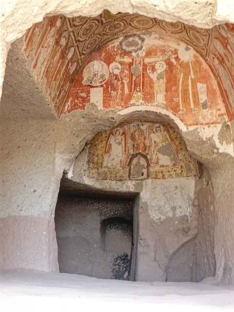 Üzümlü Church frescoes with grapevine motifs and saints in Red Valley