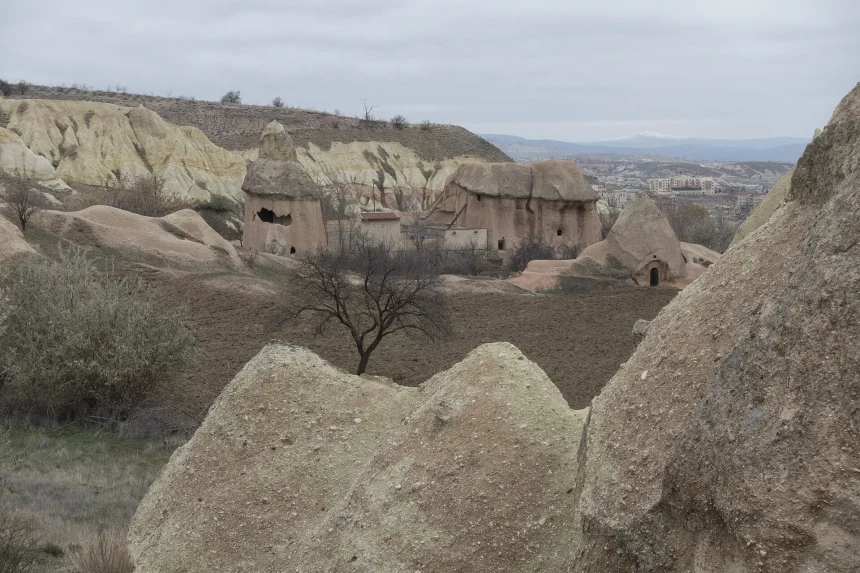 Rock-cut chambers and stone facade of Saint Nicholas Monastery in Mustafapaşa