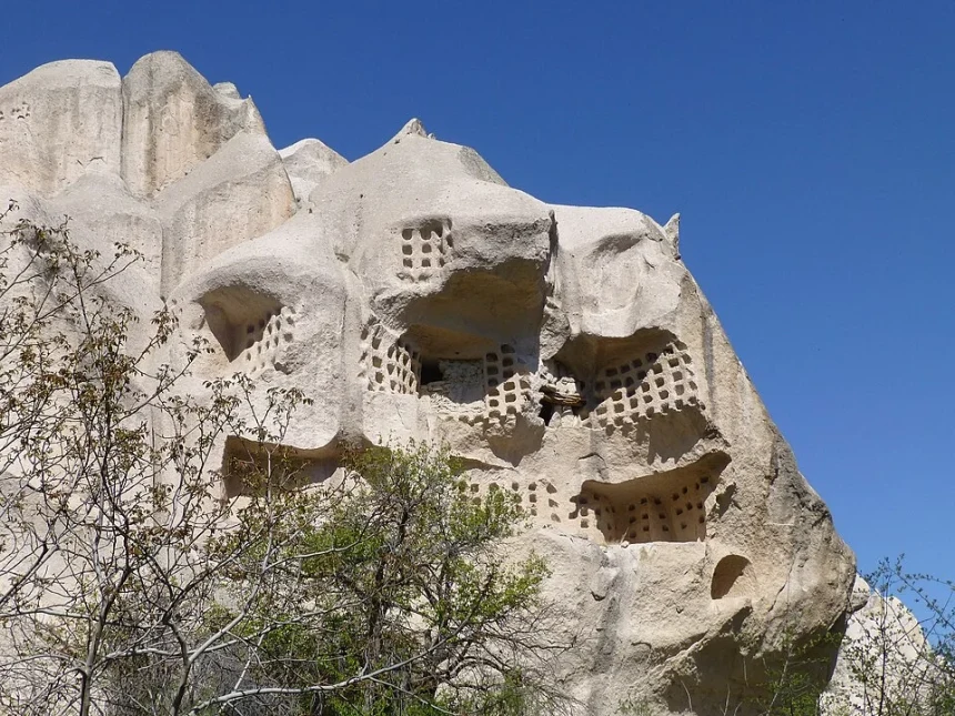 Large pigeon-house facades carved into the cliffs of Üzengi Valley