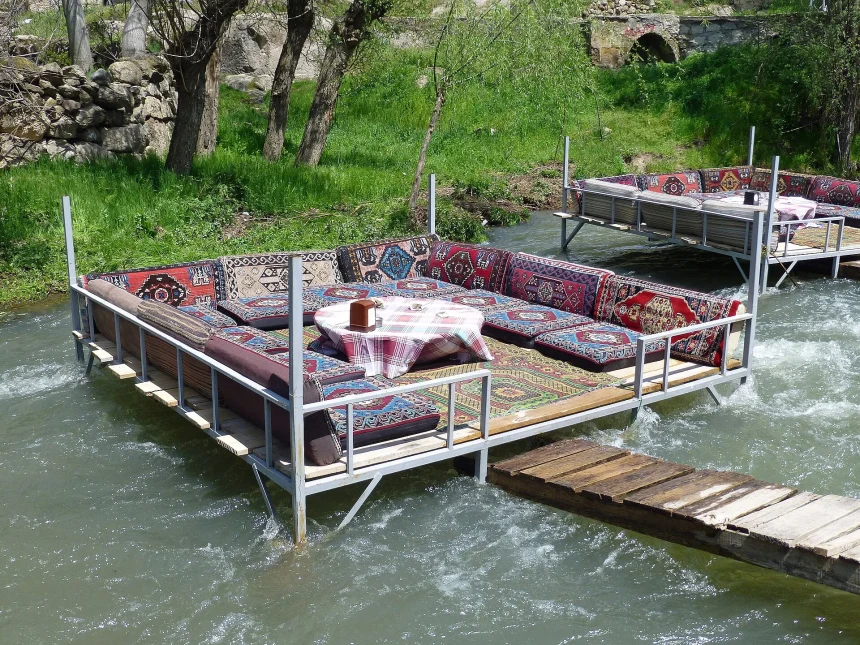 Riverside walking and dining area beside the Melendiz River in Belisırma