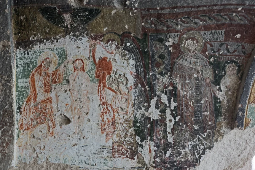 Three carved crosses inside Üç Haçlı Church in Red Valley
