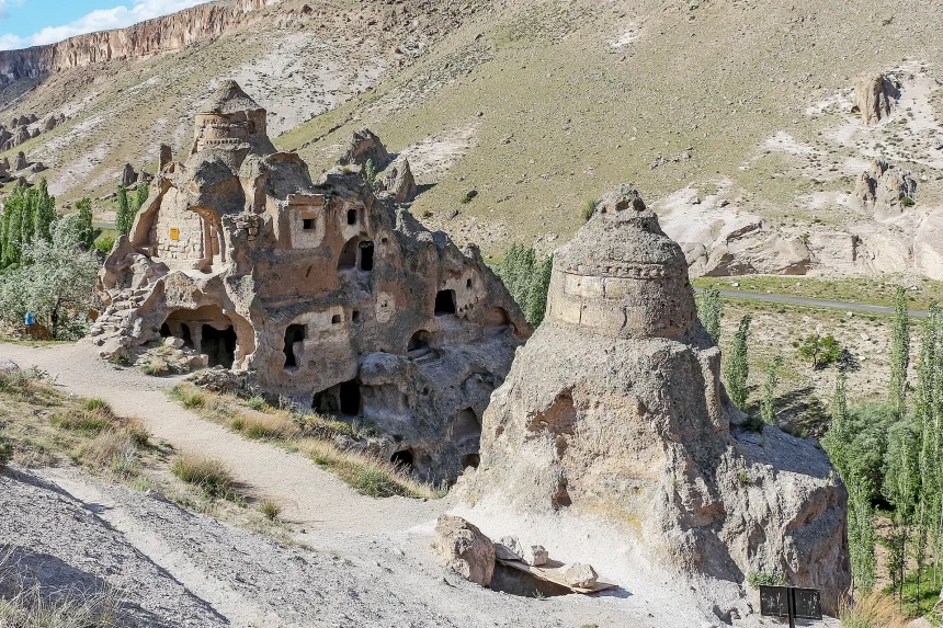Kubbeli Church carved into a conical rock formation in Soğanlı Valley